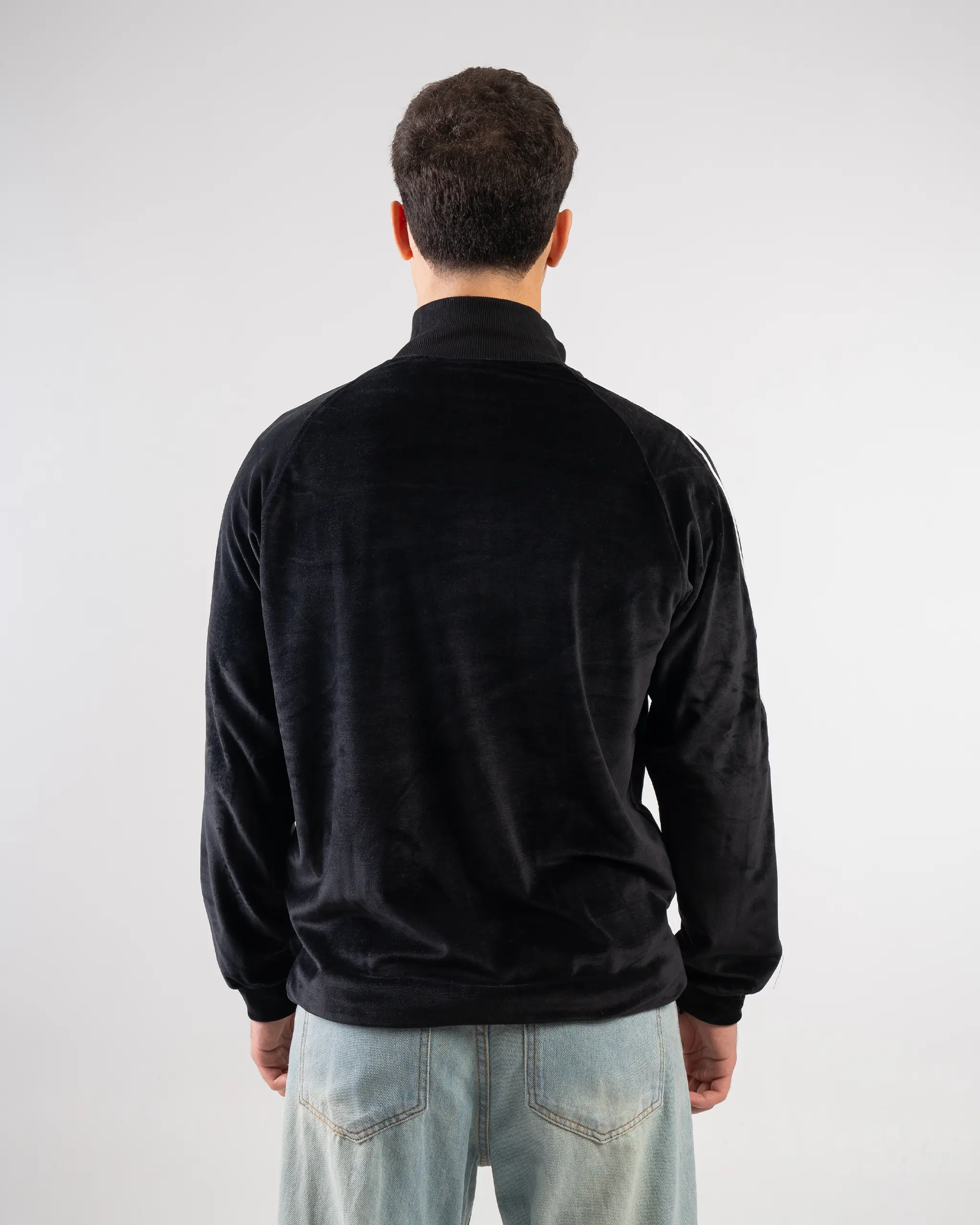 Black velvet plain jacket zip-up with a soft texture and minimalist design