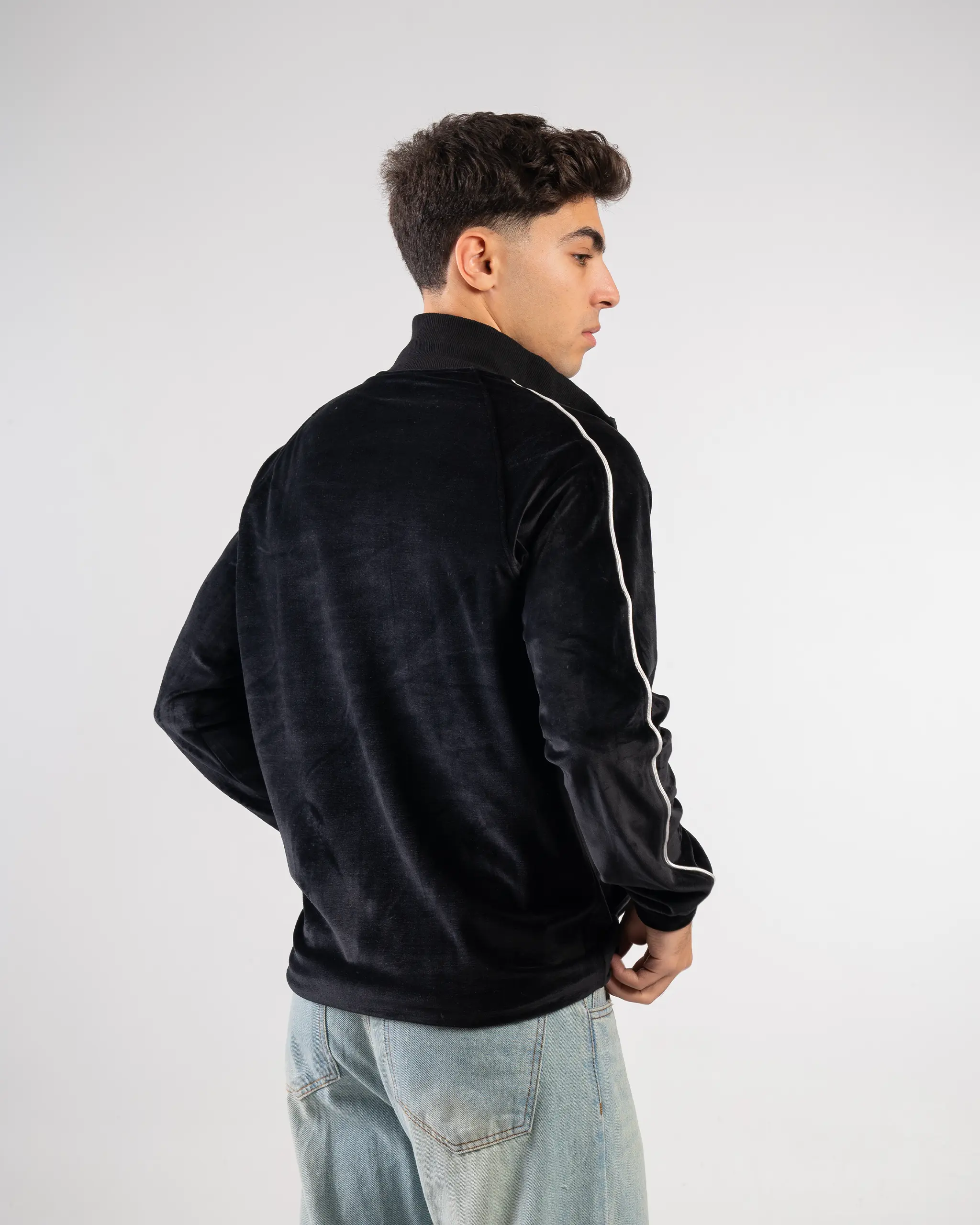 Black velvet plain jacket zip-up with a soft texture and minimalist design