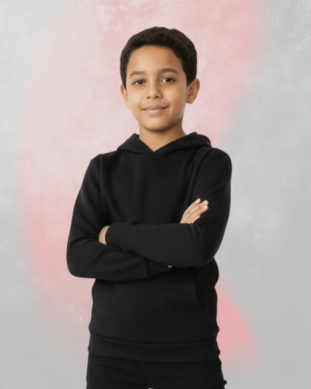 Kid wearing a plain black sweatshirt with a simple, clean design.